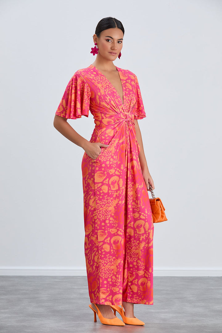 Angel Sleeve Twist Maxi Jumpsuit in Tropical Fuchsia print