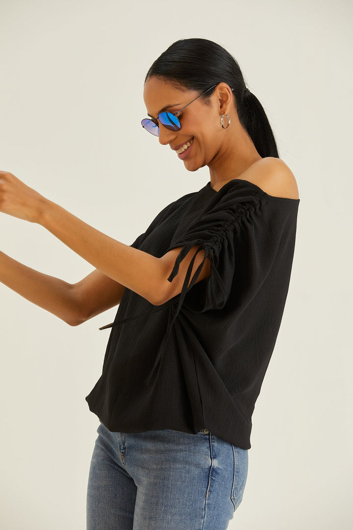 Off Shoulder Oversize Top in Black - jqwholesale.com